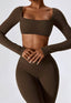 The model wearing Mojave 2pcs Set: Long Sleeved Crop Top & Pants slimming shaper tight lifting jumpsuit romper leggings bodysuit yoga outfit set