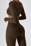 The model wearing Mojave Long Sleeved Crop Top slimming shaper tight lifting jumpsuit romper leggings bodysuit yoga outfit set