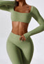 The model wearing Mojave Long Sleeved Crop Top slimming shaper tight lifting jumpsuit romper leggings bodysuit yoga outfit set