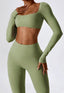 The model wearing Mojave Long Sleeved Crop Top slimming shaper tight lifting jumpsuit romper leggings bodysuit yoga outfit set