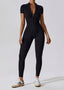 The model wearing Mojave Short Sleeve Jumpsuit slimming shaper tight lifting jumpsuit romper leggings bodysuit yoga outfit set