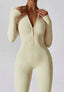 The model wearing Mojave Long Sleeved Jumpsuit slimming shaper tight lifting jumpsuit romper leggings bodysuit yoga outfit set