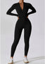 The model wearing Mojave Long Sleeved Jumpsuit slimming shaper tight lifting jumpsuit romper leggings bodysuit yoga outfit set