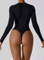 The model wearing Mojave Long Sleeve Bodysuit slimming shaper tight lifting jumpsuit romper leggings bodysuit yoga outfit set