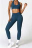 The model wearing Navy Blue Alanya 2pcs Set: High Waist Leggings & Sports Bra slimming shaper tight lifting jumpsuit romper leggings bodysuit yoga outfit set