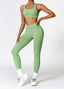 The model wearing Light green Alanya 2pcs Set: High Waist Leggings & Sports Bra slimming shaper tight lifting jumpsuit romper leggings bodysuit yoga outfit set