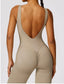 The model wearing TOKYO Seamless Jumpsuit slimming shaper tight lifting jumpsuit romper leggings bodysuit yoga outfit set