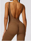 The model wearing TOKYO Seamless Jumpsuit slimming shaper tight lifting jumpsuit romper leggings bodysuit yoga outfit set