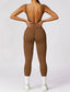 The model wearing TOKYO Seamless Jumpsuit slimming shaper tight lifting jumpsuit romper leggings bodysuit yoga outfit set