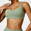 The model wearing Emerald Green Bahamas Sports Bras - NUFIT STORE slimming shaper tight lifting jumpsuit romper leggings bodysuit yoga outfit set