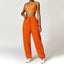 The model wearing Orange Set Malibu Yoga Set Clothes Sportswear Sports Bra & Pants prisoner prison orange- NUFIT STORE jumpsuit romper slimming shaper tight lifting jumpsuit romper leggings bodysuit yoga outfit set