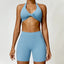 The model wearing Blue Set Miami Yoga Set Sport Shorts & Bra - NUFIT STORE slimming shaper tight lifting jumpsuit romper leggings bodysuit yoga outfit set