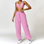 The model wearing Pink Set Malibu Yoga Set Clothes Sportswear Sports Bra & Pants - NUFIT STORE slimming shaper tight lifting jumpsuit romper leggings bodysuit yoga outfit set