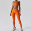 The model wearing orange set Valencia Yoga Clothing Sets Athletic Wear High Waist Leggings & Sports Bra - NUFIT STORE slimming shaper tight lifting jumpsuit romper leggings bodysuit yoga outfit set