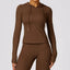 The model wearing Huacha Brown Jamaica Yoga Long Sleeved Fitness Shirt - NUFIT STORE slimming shaper tight lifting jumpsuit romper leggings bodysuit yoga outfit set