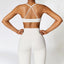 The model wearing Pearl Grey Set Cannes Yoga Set Leggings & Sports Bra - NUFIT STORE slimming shaper tight lifting jumpsuit romper leggings bodysuit yoga outfit set