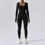 The model wearing black Seamless Yoga Suit Women's Bodysuit Spring Dance Fitness Clothes Gym Push Up Workout Bodysuit Tight Long-Sleeved Athletic Wear - NUFIT STORE slimming shaper tight lifting jumpsuit romper leggings bodysuit yoga outfit set