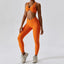 The model wearing Tropical Orange Valencia Yoga Clothing Sets Athletic Wear High Waist Leggings & Sports Bra - NUFIT STORE slimming shaper tight lifting jumpsuit romper leggings bodysuit yoga outfit set