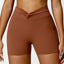 The model wearing Caramel brown Portofino Shorts - NUFIT STORE slimming shaper tight lifting jumpsuit romper leggings bodysuit yoga outfit set