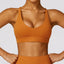 The model wearing Earl Orange Space Sports Bra Training Yoga Clothes - NUFIT STORE front view slimming shaper tight lifting jumpsuit romper leggings bodysuit yoga outfit set