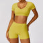 The model wearing Curry Yellow Set Morocco Yoga Sets Crop Top & Stretch Shorts - NUFIT STORE slimming shaper tight lifting jumpsuit romper leggings bodysuit yoga outfit set