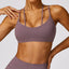 The model wearing Dousha Purple Bali Sports Bra Straps - NUFIT STORE slimming shaper tight lifting jumpsuit romper leggings bodysuit yoga outfit set