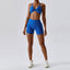 The model wearing Klein Blue Set Wynwood Seamless Yoga Set Fitness Sports Bra High Waist Shorts - NUFIT STORE slimming shaper tight lifting jumpsuit romper leggings bodysuit yoga outfit set