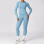 The model wearing Haze Blue Set Jamaica Yoga Set Seamless Sportswear Long Sleeve & Leggings - NUFIT STORE slimming shaper tight lifting jumpsuit romper leggings bodysuit yoga outfit set