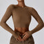 The model wearing Brown Brooklyn T-shirt Cotton Long Sleeve Sports Top - NUFIT STORE slimming shaper tight lifting jumpsuit romper leggings bodysuit yoga outfit set