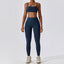 The model wearing Emblem Blue Set Mojave Yoga Sets Sports Bra & Leggings - NUFIT STORE slimming shaper tight lifting jumpsuit romper leggings bodysuit yoga outfit set