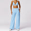 The model wearing Milk Blue Set Monaco Yoga Set Sports Bra & Pants - NUFIT STORE slimming shaper tight lifting jumpsuit romper leggings bodysuit yoga outfit set