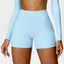 The model wearing Sky Blue Bahamas Fitness Shorts - NUFIT STORE slimming shaper tight lifting jumpsuit romper leggings bodysuit yoga outfit set