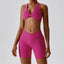 The model wearing Magenta Valencia Yoga Clothing Sets Athletic Wear High Waist Shorts & Sports Bra - NUFIT STORE slimming shaper tight lifting jumpsuit romper leggings bodysuit yoga outfit set