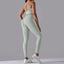 The model wearing light gray Maui Seamless Set Top & Leggings - NUFIT STORE slimming shaper tight lifting jumpsuit romper leggings bodysuit yoga outfit set