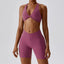 The model wearing Crimson Purple Valencia Yoga Clothing Sets Athletic Wear High Waist Shorts & Sports Bra - NUFIT STORE slimming shaper tight lifting jumpsuit romper leggings bodysuit yoga outfit set