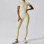 The model wearing Mojave Short Sleeve Jumpsuit slimming shaper tight lifting jumpsuit romper leggings bodysuit yoga outfit set