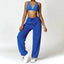 The model wearing Blue Set Malibu Yoga Set Clothes Sportswear Sports Bra & Pants - NUFIT STORE slimming shaper tight lifting jumpsuit romper leggings bodysuit yoga outfit set