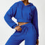 The model wearing blue Malibu Long-sleeved Sweater - NUFIT STORE front view slimming shaper tight lifting jumpsuit romper leggings bodysuit yoga outfit set