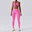 The model wearing Pink Powder Set Wynwood Seamless Yoga Set Fitness Sports Bra High Waist Leggings - NUFIT STORE slimming shaper tight lifting jumpsuit romper leggings bodysuit yoga outfit set