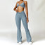 The model wearing Haze Blue Set Portofino Yoga Sets Sports Bra & Pants - NUFIT STORE slimming shaper tight lifting jumpsuit romper leggings bodysuit yoga outfit set