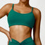 The model wearing Sea King Green Portofino Sports Bra - NUFIT STORE slimming shaper tight lifting jumpsuit romper leggings bodysuit yoga outfit set