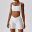 The model wearing Swan White Valencia Yoga Clothing Sets Athletic Wear High Waist Shorts & Sports Bra - NUFIT STORE slimming shaper tight lifting jumpsuit romper leggings bodysuit yoga outfit set