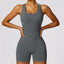 The model wearing Volcanic ash Beverly Jumpsuits Push Up Bodysuit Sportswear - NUFIT STORE slimming shaper tight lifting jumpsuit romper leggings bodysuit yoga outfit set