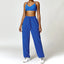 The model wearing Blue Set Malibu Yoga Set Clothes Sportswear Sports Bra & Pants - NUFIT STORE slimming shaper tight lifting jumpsuit romper leggings bodysuit yoga outfit set