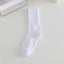 The model wearing White Nude Casual Socks - NUFIT STORE slimming shaper tight lifting jumpsuit romper leggings bodysuit yoga outfit set