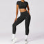 The model wearing Advanced Black Set Bali Yoga Set Crop Top & Leggings - NUFIT STORE slimming shaper tight lifting jumpsuit romper leggings bodysuit yoga outfit set