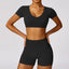 The model wearing Advanced Black Set Morocco Yoga Sets Crop Top & Stretch Shorts - NUFIT STORE slimming shaper tight lifting jumpsuit romper leggings bodysuit yoga outfit set