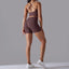 The model wearing Pomegranate violet Maui Seamless Set Sports Bra & Shorts - NUFIT STORE slimming shaper tight lifting jumpsuit romper leggings bodysuit yoga outfit set