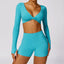 The model wearing Lake Blue Set-5 Morocco Yoga Sets Long Sleeve & Stretch Shorts - NUFIT STORE slimming shaper tight lifting jumpsuit romper leggings bodysuit yoga outfit set