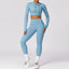 The model wearing Haze Blue Set Jamaica Yoga Set Seamless Sportswear Long Sleeve Crop Top & Leggings - NUFIT STORE slimming shaper tight lifting jumpsuit romper leggings bodysuit yoga outfit set